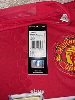 CHRIS SMALLING Signed Manchester United Shirt. Still in original Sleve/Envelope