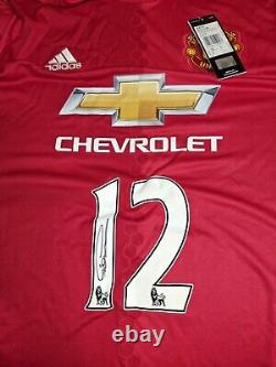 CHRIS SMALLING Signed Manchester United Shirt. Still in original Sleve/Envelope