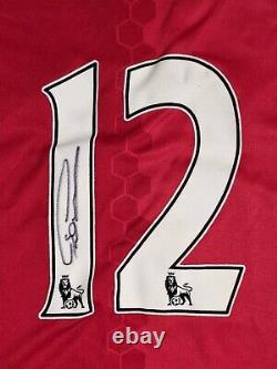 CHRIS SMALLING Signed Manchester United Shirt. Still in original Sleve/Envelope