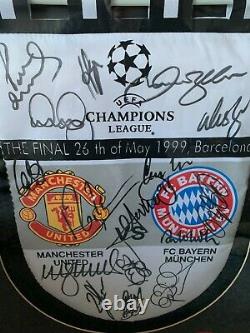 Frame and signed manchester united 1999 champioms league pennant coa
