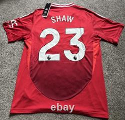 Luke Shaw #23 Hand Signed Manchester United Home Football Shirt with Photo Proof
