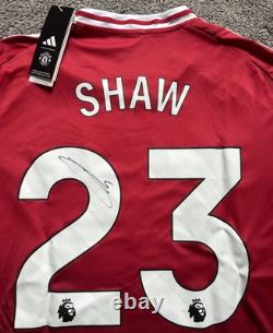 Luke Shaw #23 Hand Signed Manchester United Home Football Shirt with Photo Proof