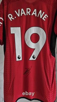 Manchester United Shirt Hand Signed By Raphael Varane
