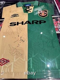 Manchester United signed 1992 1994 dual shirt display. Green and gold