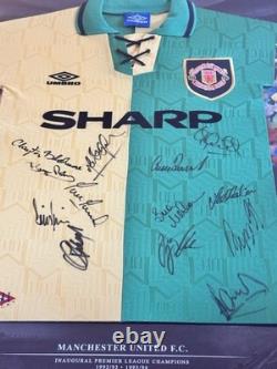 Manchester United signed 1992/94 signed green and gold away shirt