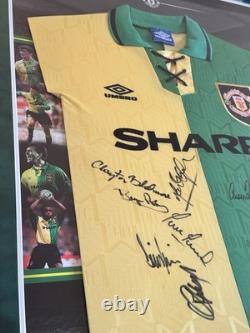 Manchester United signed 1992/94 signed green and gold away shirt