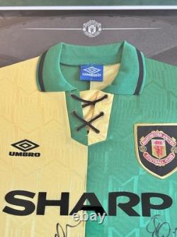 Manchester United signed 1992/94 signed green and gold away shirt