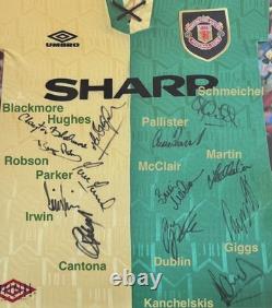 Manchester United signed 1992/94 signed green and gold away shirt