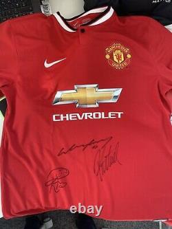 Manchester United signed Home shirt. Includes Rooney and Fletcher