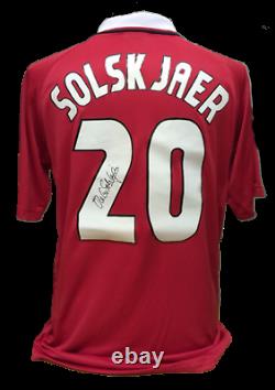 SHERINGHAM & SOLSKJAER 2 SIGNED MANCHESTER UNITED SHIRTS in 1 FRAME COA & PROOF