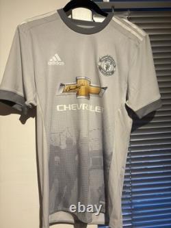 Signed Sir Bobby Charlton, Manchester United Adidas Third Kit, 2017/2018. COA