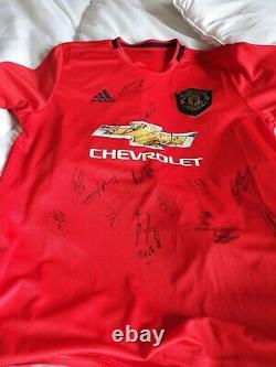 Signed football shirt hand signed by almost full squad of Manchester United