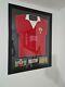 Sir Bobby Charlton SIGNED Manchester United Shirt, Framed With COA